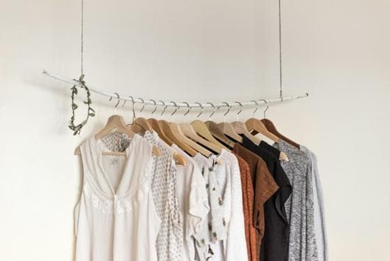 Clothing rail with a neutral-toned wardrobe