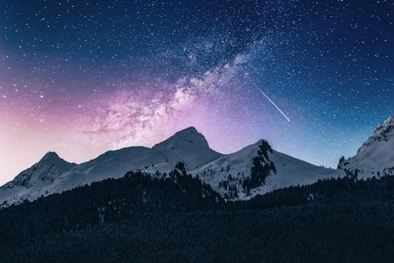 The Milky Way over a mountain ridge
